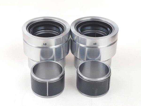 Fork extensions with Teflon upper and lower bushing set for smoother action.  Also see aluminum sleeves and damper upgrade.