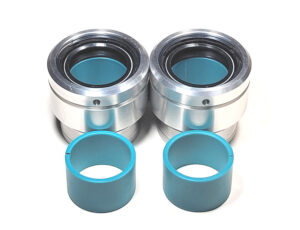 Fork extensions with slippery Turcite bushing set for smoother action.  Also see aluminum sleeves and damper upgrade.