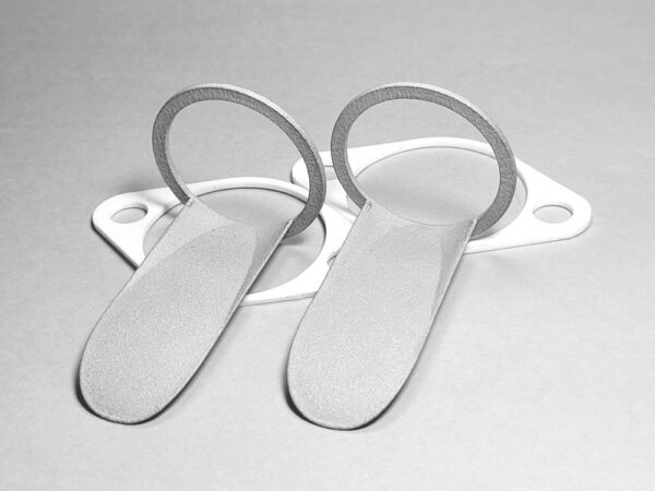 Raised intake D port floor alum shoes and teflon heat insulating gaskets (2 ea) for RH10 and all 30mm port heads.  Some raised porting may be required to increase performance.